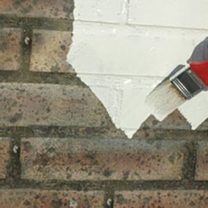 E-B in use on an exterior wall Emulsa-Bond (E-B) being used on a wall