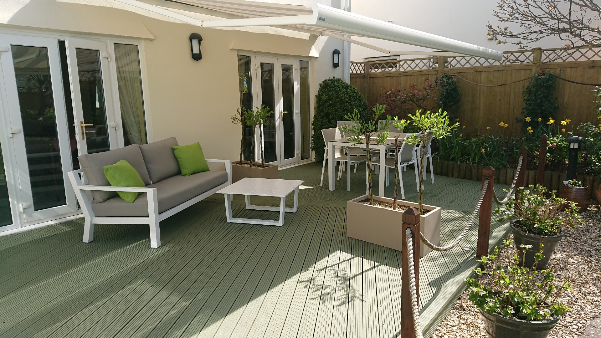 Garden deck with green paint finish
