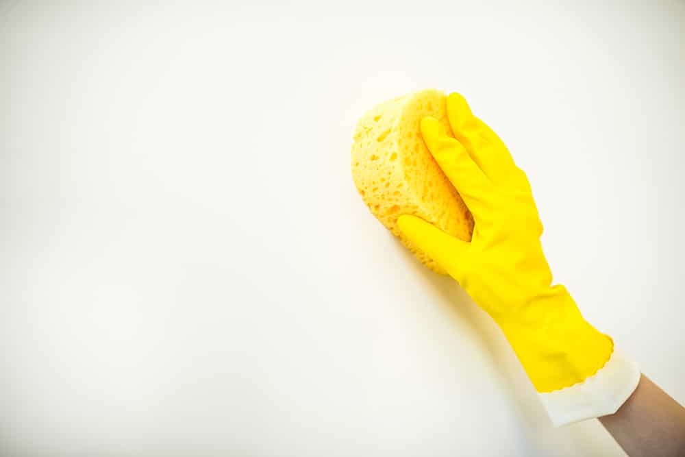 cleaning an interior wall