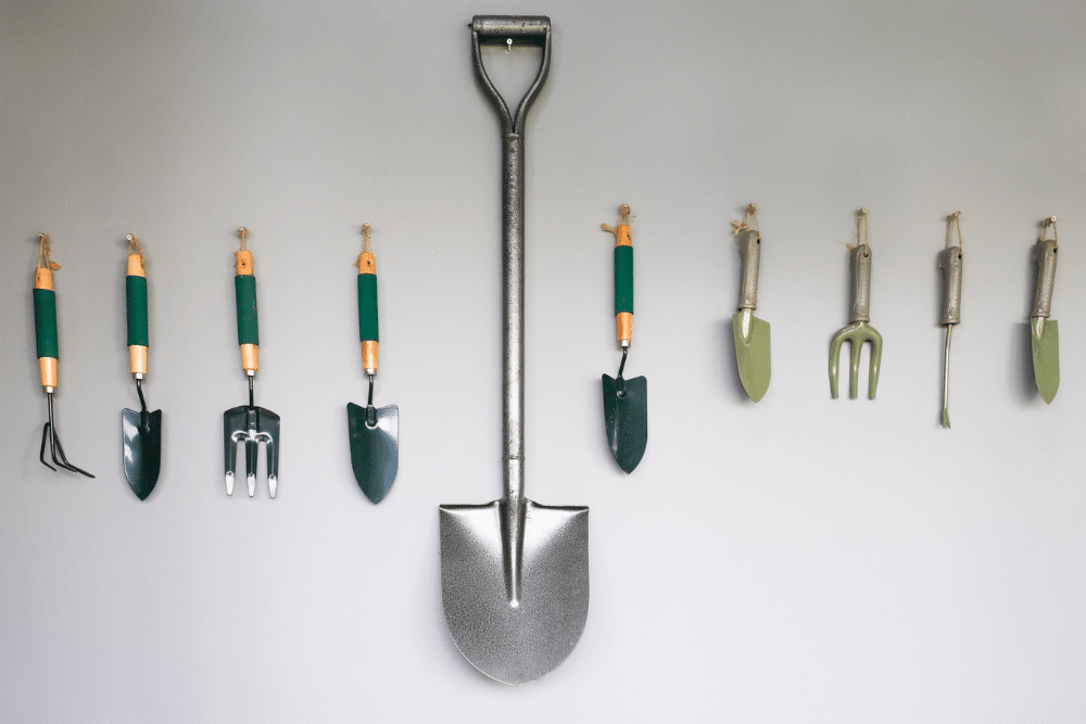 garden tools hanging on wall